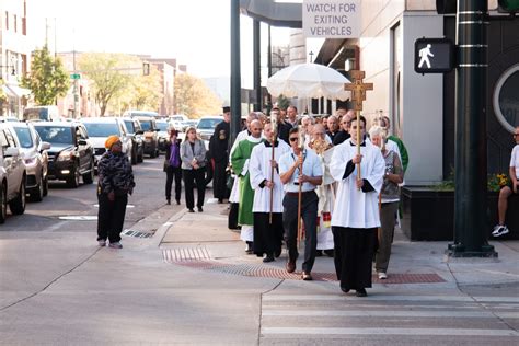 200 financial professionals process with Jesus through downtown Denver ...