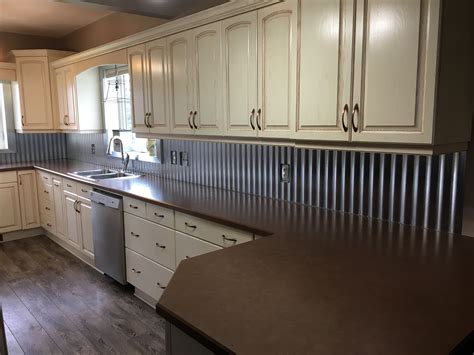 Corrugated Steel Backsplash www.arlel.ca | Farmhouse kitchen design ...