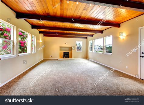 New Large Empty Living Room With Wood Ceiling And Fireplace. Stock Photo 128332673 : Shutterstock