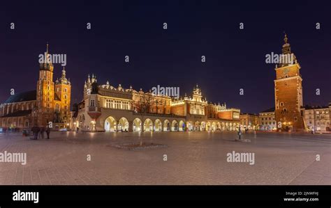 Old town square in Krakow at night, Poland. St. Marys Basilica. Travel ...