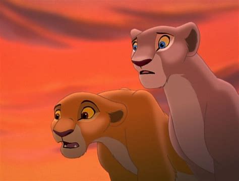 Queen Nala and her daughter, Princess Kiara, watching as King Simba ...