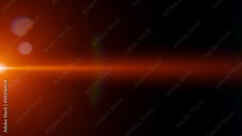 abstract orange lens flare effect overlay texture with bokeh effect and light streak in front of ...