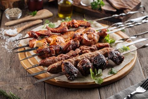 Premium Photo | Assorted caucasian shashlik skewers and kebabs