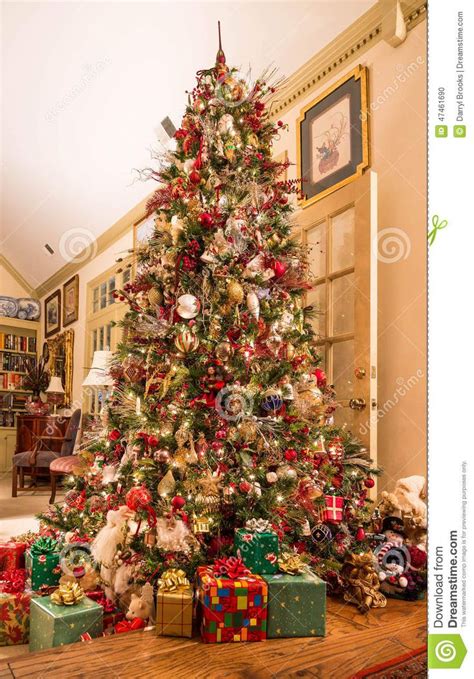 Presents Under Decorated Christmas Tree in Den | Christmas tree ...