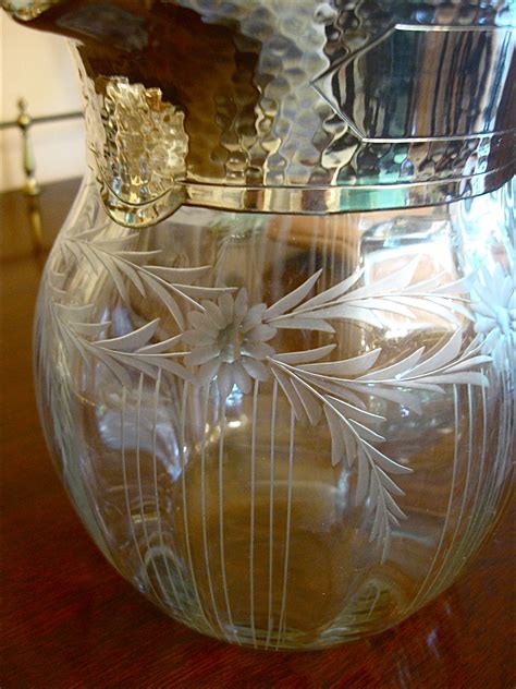 Glass Lemonade Pitcher with Engraving, Silver Rim | Antiques Board