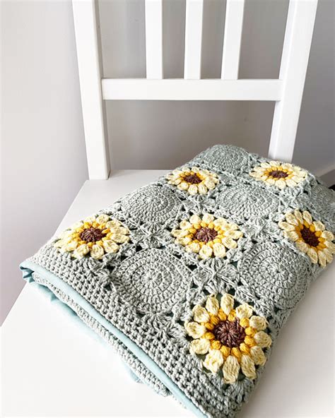 Ravelry: Here comes the sunflowers blanket pattern by Fran Mori