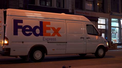 FedEx delivery truck parked on street in downtown New York City at night 4k Stock Video Footage ...