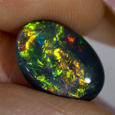 stunning black opal | Australian black opal, Expensive jewelry luxury, Opal