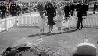 Jackie Kennedy visits the grave of her husband JFK with her children Caroline and John jr /May ...