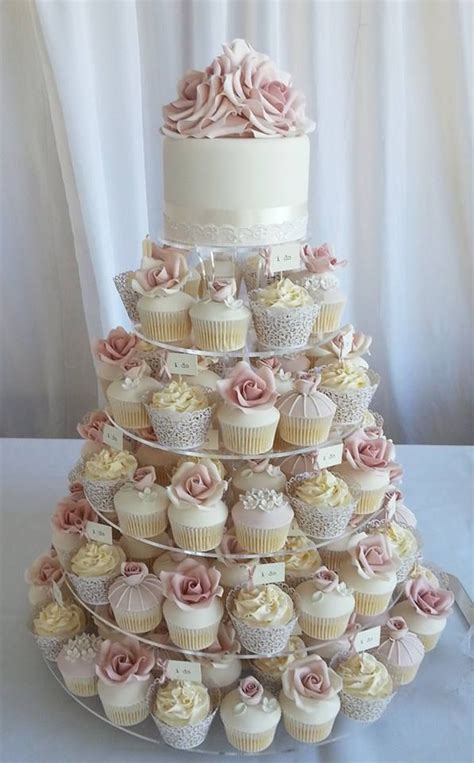 Beautiful cupcake tower with wedding cake | Wedding cupcakes, Wedding cakes, Wedding cakes with ...