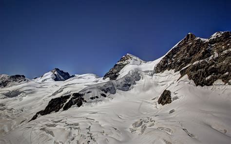 Jungfraujoch: White Wonderland Amid Stunning Mountains and Glaciers