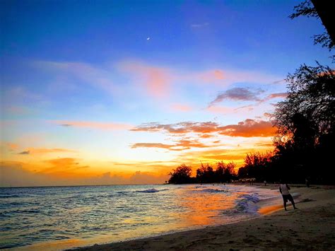 Accra beach at sunset in Barbados. | Great vacations, Barbados beaches, Vacation