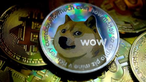 Dogecoin tumbles after Elon Musk jokes about it on SNL | CNN Business