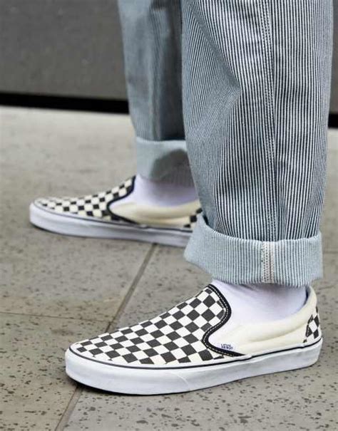 Vans Slip-On checkerboard plimsolls in black | ASOS