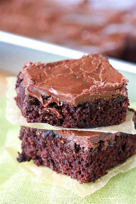 Easy Zucchini Brownies with 1 minute Frosting! These are quick to make... and the zucchini keeps ...