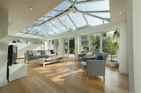 L shaped contemporary orangery | Living room extension ideas, Beautiful ...