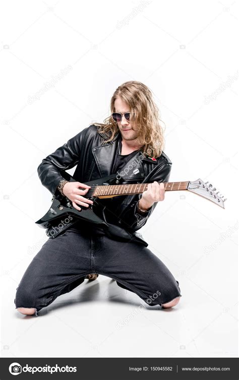 Rocker with electric guitar — Stock Photo © DmitryPoch #150945582