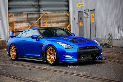 Outstanding Blue Nissan GT-R with Custom Vented Hood and Gold Rims | Nissan gtr, Nissan gt-r ...