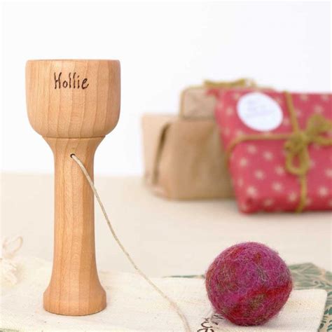 cup and ball game • traditional scoop ball game • Love Heartwood