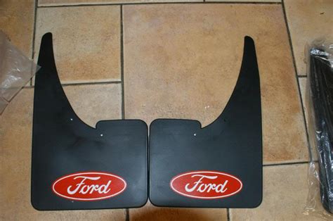 ford mudflaps logo blue or red - PassionFord - Ford Focus, Escort & RS Forum Discussion