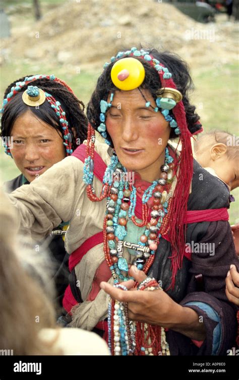 Tibetan man wearing traditional jewelry,Tibet,china Stock Photo - Alamy