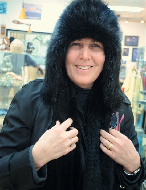 Alaskan Debra Fitzgerald modeling a black fox fur hat, bri… | Flickr