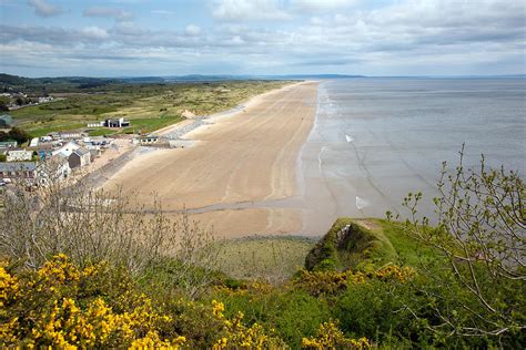 Coast at Pendine Sands beach Carmarthen Bay South Wales between ...