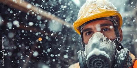 Professional construction worker wearing dust mask surrounded by many ...