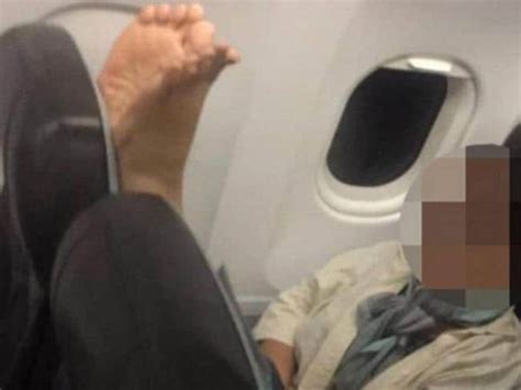 Passenger shames woman for putting feet on seats