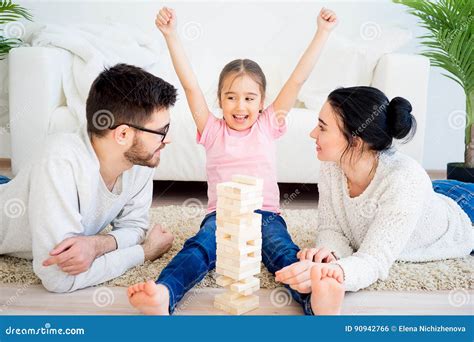 Family playing jenga stock photo. Image of caucasian - 90942766