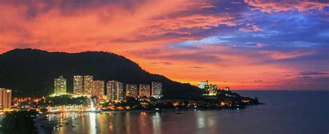 Penang sunset Photograph by Stuart C Clarke - Fine Art America