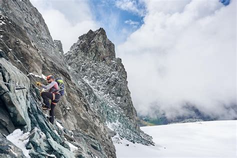 Premium Photo | Mountaineer climbing grossglockner mountain austria