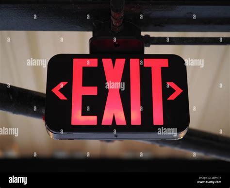 Image of a red emergency exit sign Stock Photo - Alamy