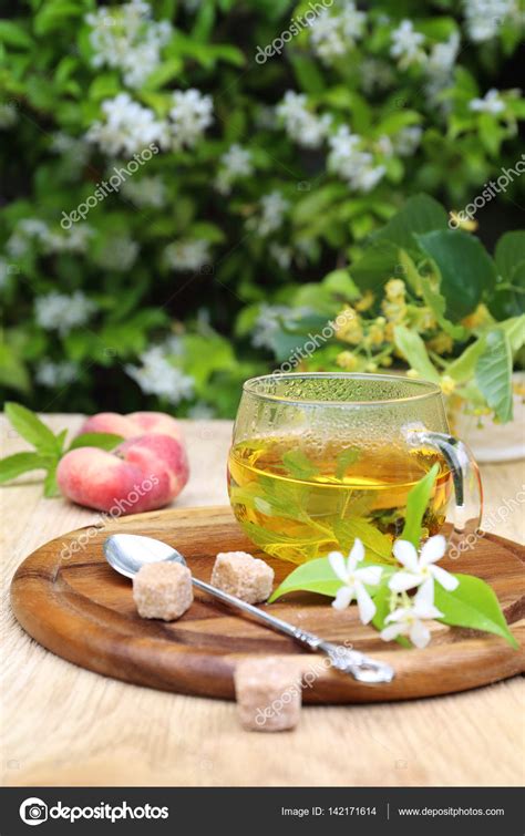 Summer Tea Party: herbal tea in the lush garden — Stock Photo ...