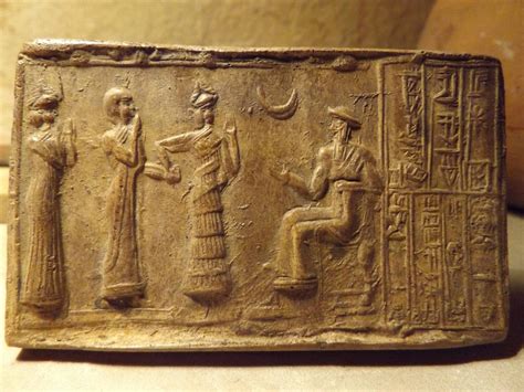 Sumerian cylinder seal of Ur Nammu. Museum replica tablet. Mesopotamian art.