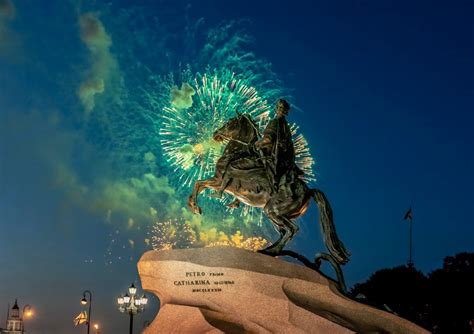 Monument against Night Sky with Fireworks · Free Stock Photo