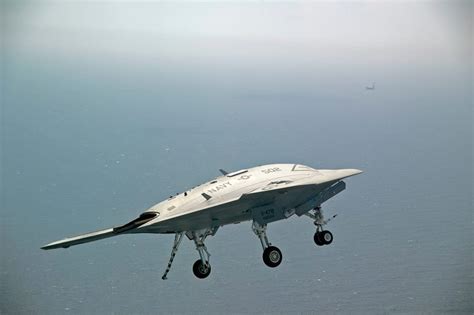 X-47B UCAV drone decided to abort landing attempt on aircraft carrier on its own without human ...