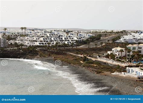 Las Coloradas Beach with Complex of Buildings in Playa Blanca, Lanzarote, Canary Islands Stock ...