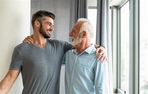 Happy Father And Son Reuniting Again Stock Photo - Download Image Now - Father, Son, Adult - iStock