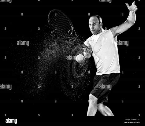 Tennis action shot. Forehand. Studio shot over black Stock Photo - Alamy