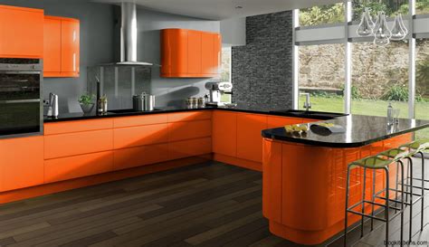 an orange kitchen with lots of counter space