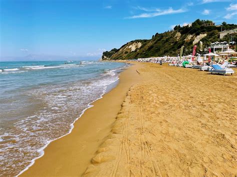 Discover the Beauty of St. Stefanos Beach with Tria Adelphia Travel