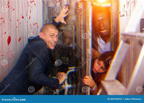 Four Friends in Quest Room with Special Horror Effects Stock Image ...