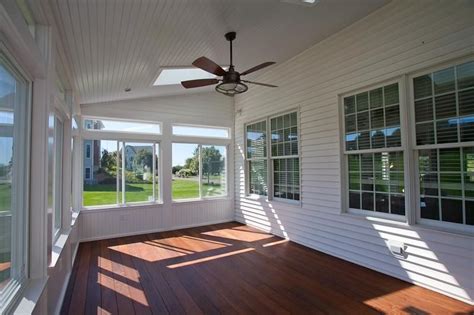 Enclosed porch on a deck with sliding windows | CT Porch Builder | Porch design, Porch builders ...