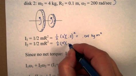 10D Angular momentum example 2 (two rotating disks collide) - YouTube