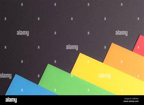 Minimalist Black paper background multicolor, copy space Stock Photo - Alamy