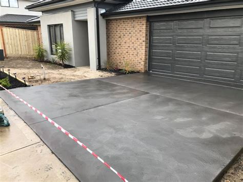 Charcoal Colour driveway ️ - H Bombardier Concreting