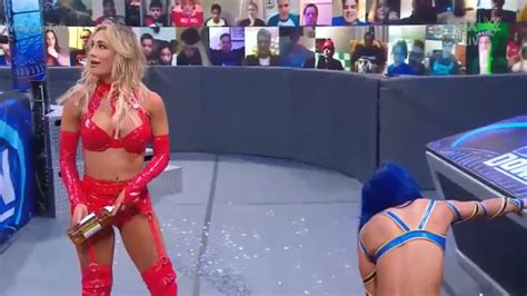 WATCH: Carmella Smashes Glass Bottle On Sasha Banks