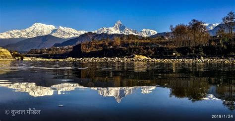 Panoramic View of Fewa Lake with reflection of Machhapuchhre Mountain ...