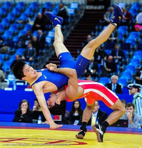 two men compete in a wrestling match